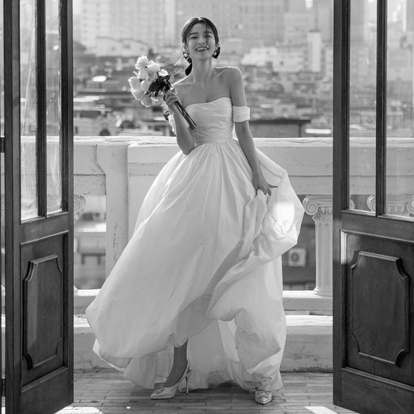 Off-Shoulder Satin Wedding Dress – Elegant Long Gown with Slit for Greeters or Ceremony (2025)