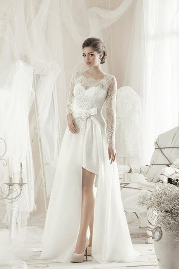 Robe trapèze mi-longue en dentelle à manches longues et à nœud et appliqués