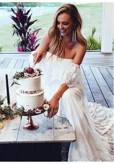 Robe de mariée trapèze en tulle à épaules dénudées et longueur au sol avec manches courtes