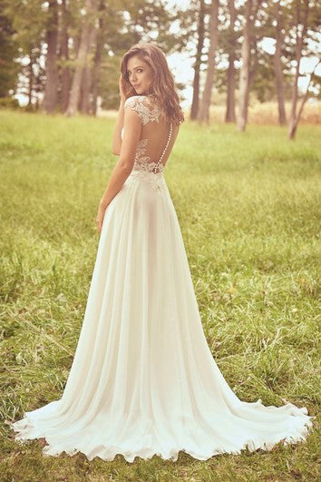 Robe de mariée en mousseline de soie avec décolleté plongeant et dos illusion à manches courtes appliquées