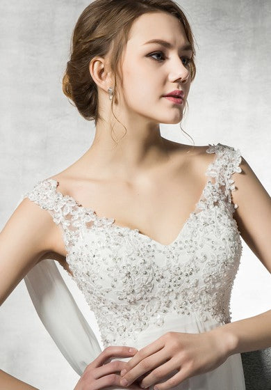 Robe trapèze empire en mousseline et dentelle avec perles et col bénitier au dos