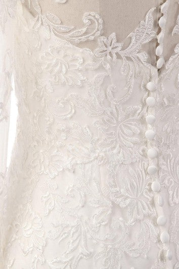 Robe sirène à manches longues en dentelle avec broderies illusion