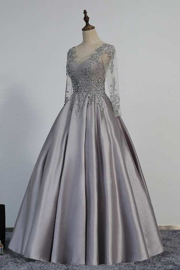 Illusion Long Sleeve V Neck Pleated Satin Ball Gown With Lace Detailing