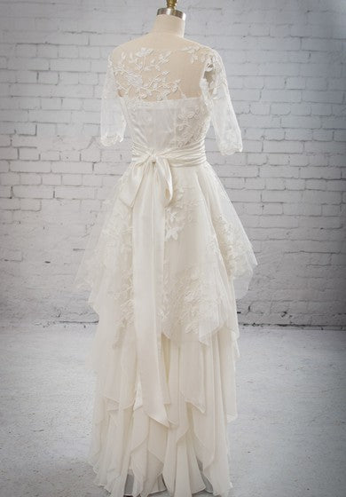 Vestido impresionante de mangas con peplum de abrazadera extraíble