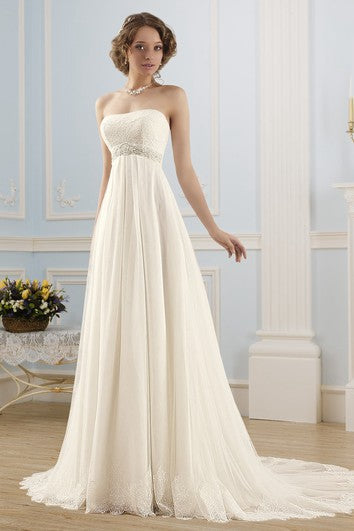 Robe trapèze longue sans bretelles, sans manches, dos corset, en tulle et dentelle, avec bijoux à la taille et plis