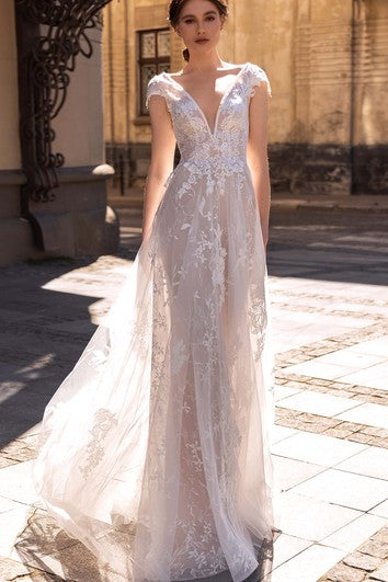 Robe de mariée élégante en dentelle trapèze, longueur au sol, dos nu, avec appliques