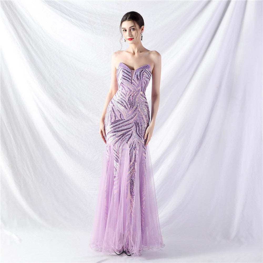 Šaty s těžkou korálkovou výšivkou a vrstvenými flitry s vsadkami z tylu