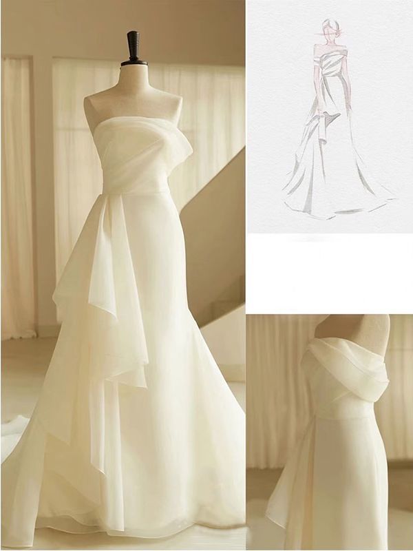 Šaty na svatbu bez ramínek – bílá saténová róba s vlečkou pro podzimní svatby (2025)