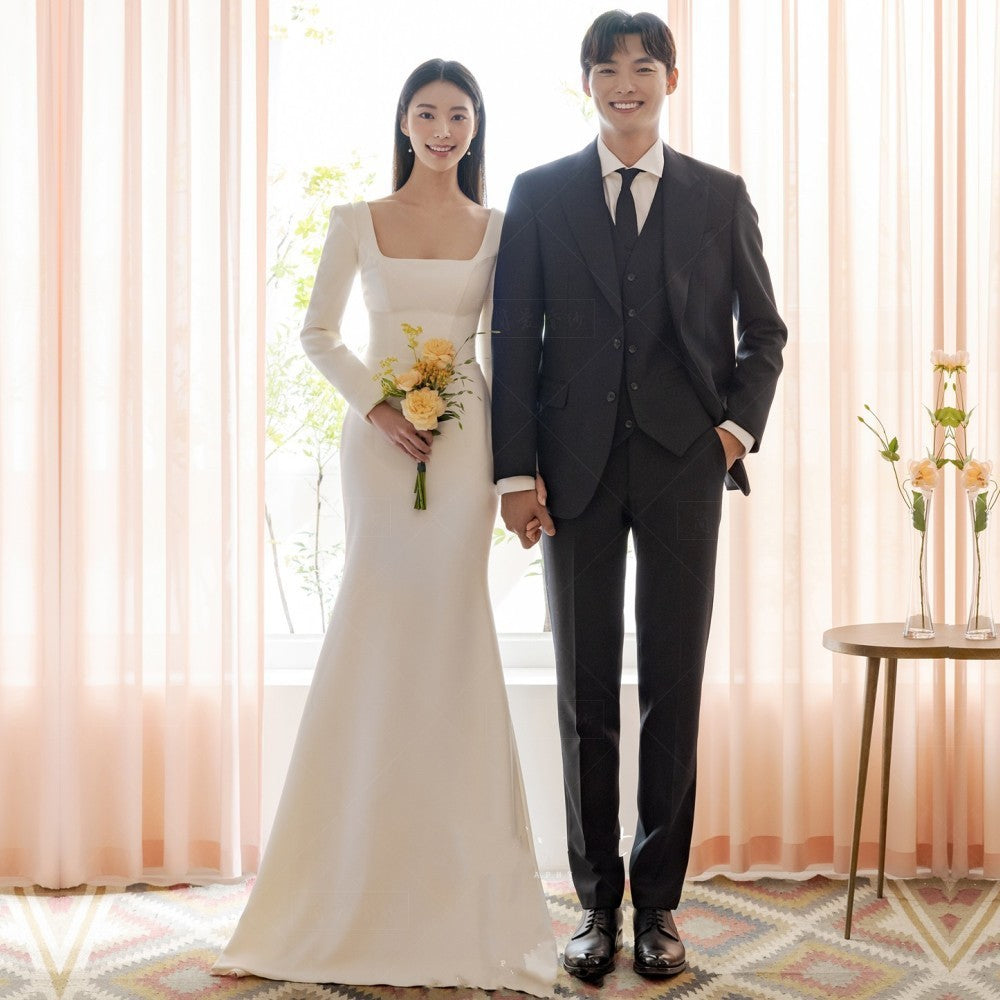 Minimalistické saténové svatební šaty ve stylu mořské panny – dlouhé rukávy s malou vlečkou pro venkovní svatby (2025)