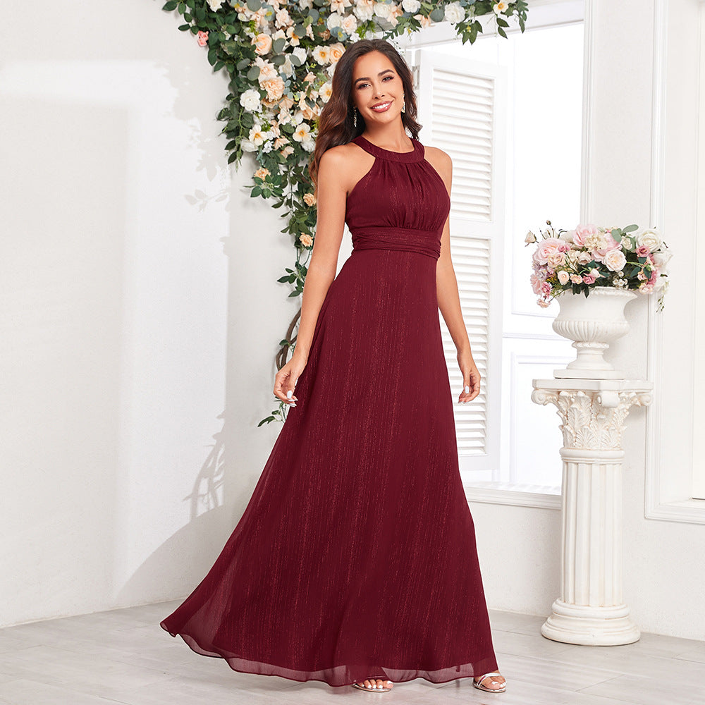 Elegantní maxi formální/večerní šaty s halter výstřihem, průstřihem na zádech, plisovaným živůtkem a áčkovou sukní