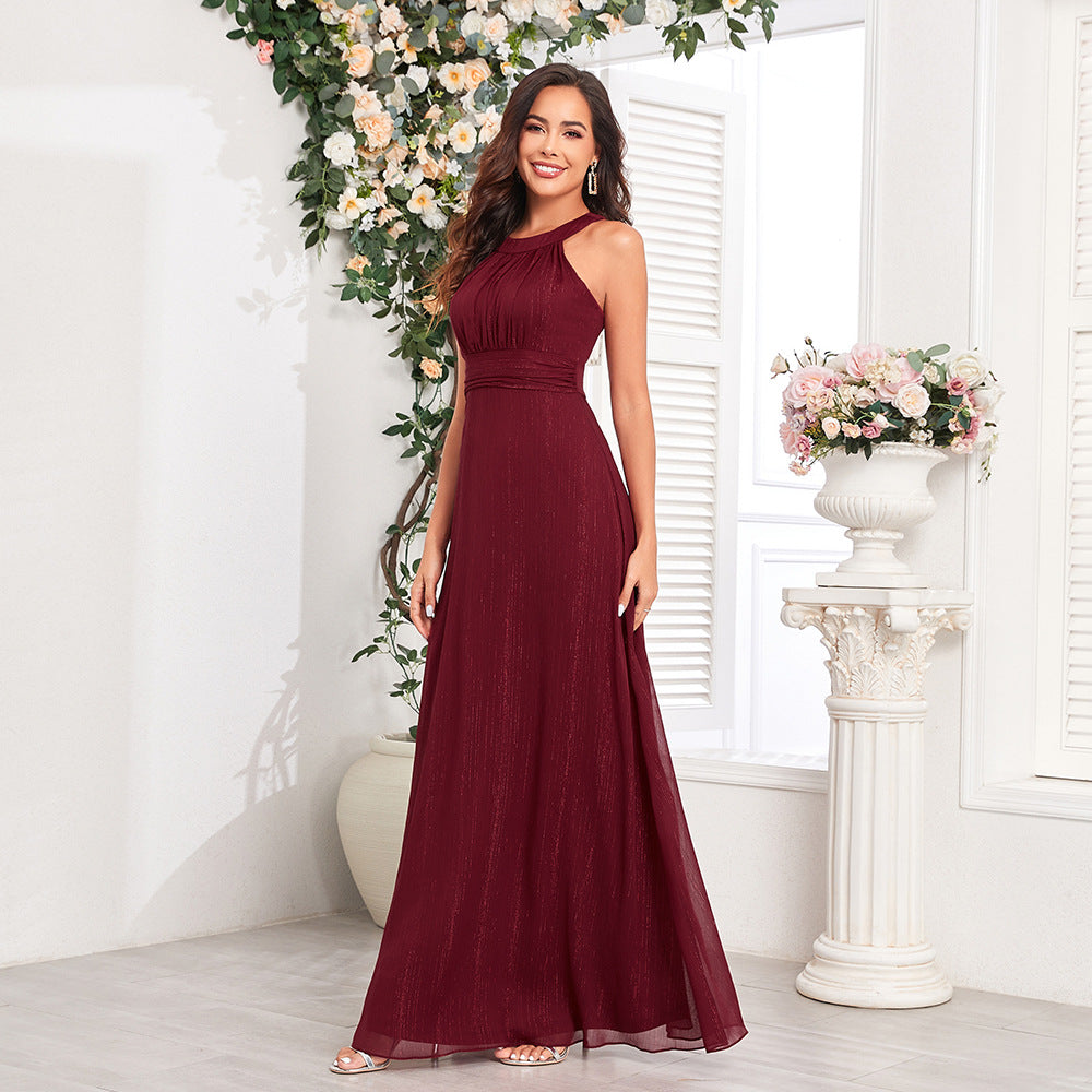 Elegantní maxi formální/večerní šaty s halter výstřihem, průstřihem na zádech, plisovaným živůtkem a áčkovou sukní