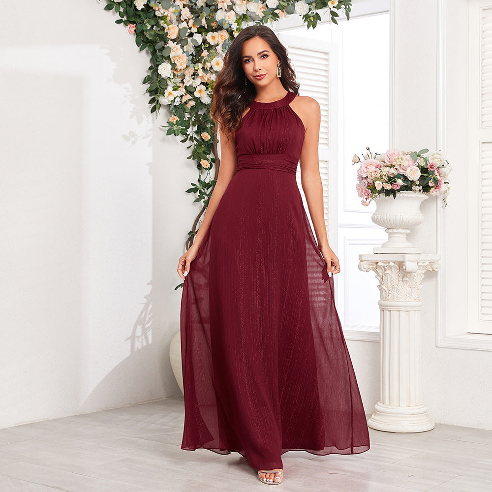 Elegantní maxi formální/večerní šaty s halter výstřihem, průstřihem na zádech, plisovaným živůtkem a áčkovou sukní