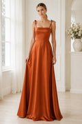 Orange Square Neck Satin A-Line Bridesmaid Dress with Tie Straps and Clean Floor Length Skirt front view