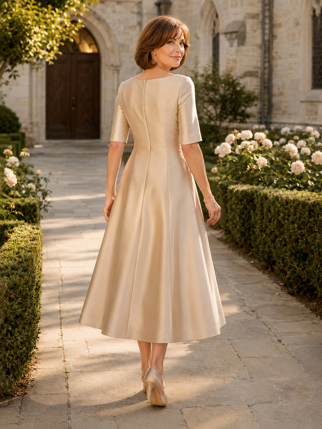 Champagne bateau neck satin tea length A line mother dress back view