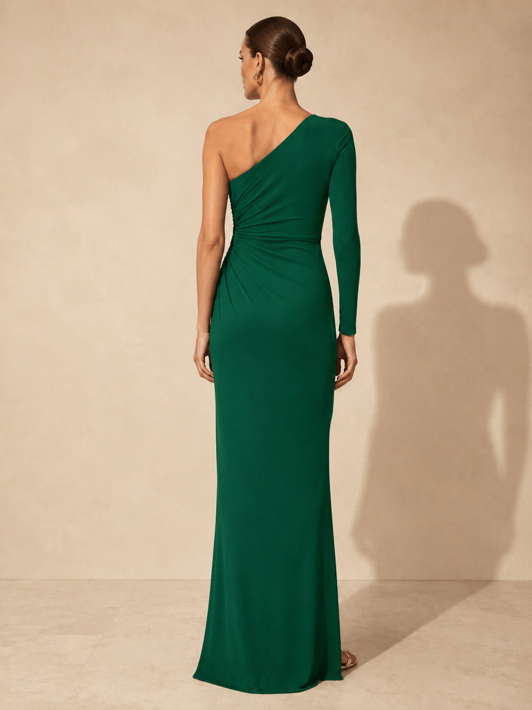 Emerald one shoulder long sleeve ruched floor length gown back view