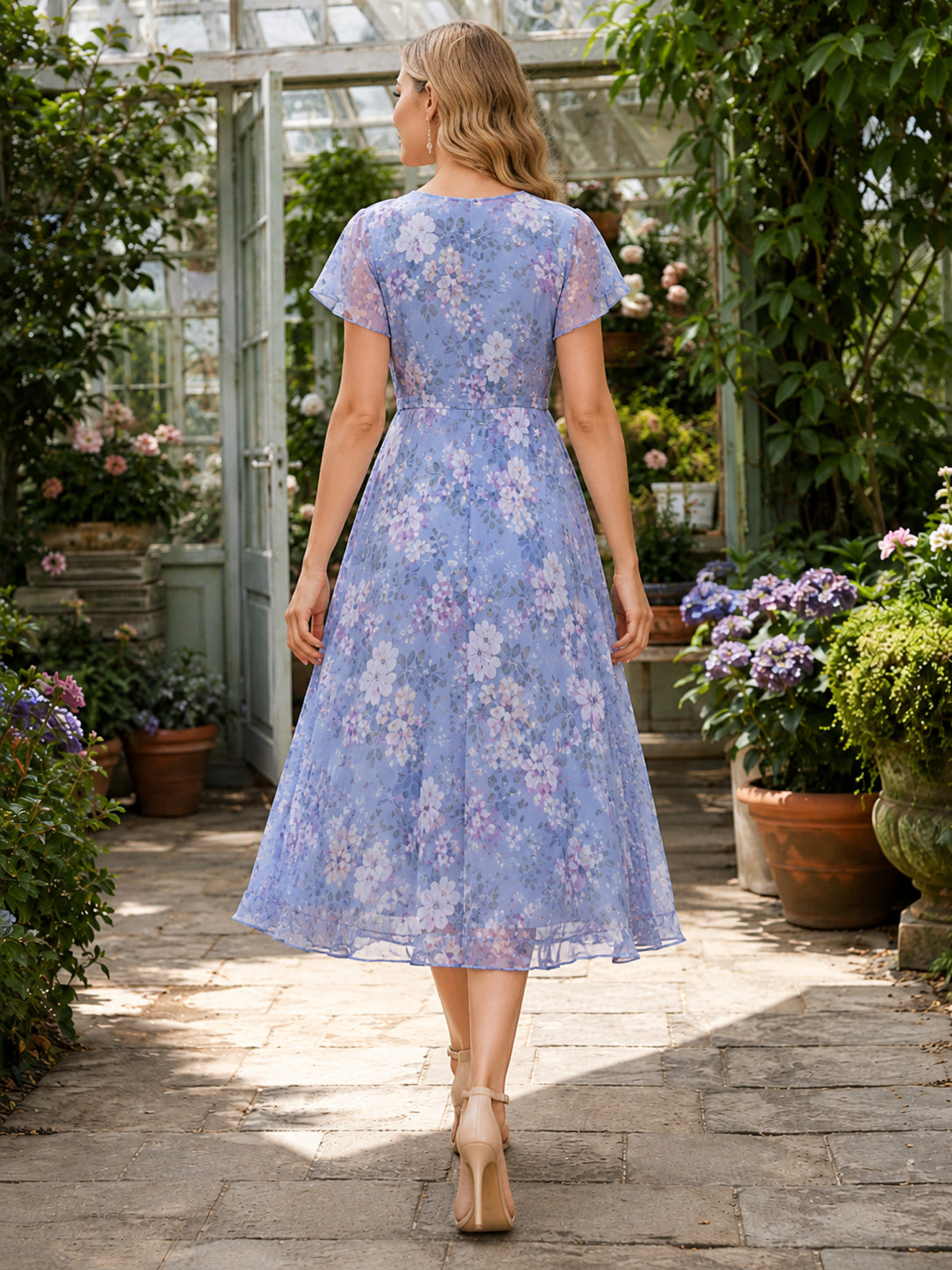 Dusty blue floral V-neck flutter sleeve garden midi dress back view