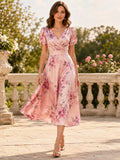 Soft pink floral puff sleeve wrap tea length garden guest dress front view