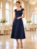 Navy square neck cap sleeve satin A-line tea dress front view