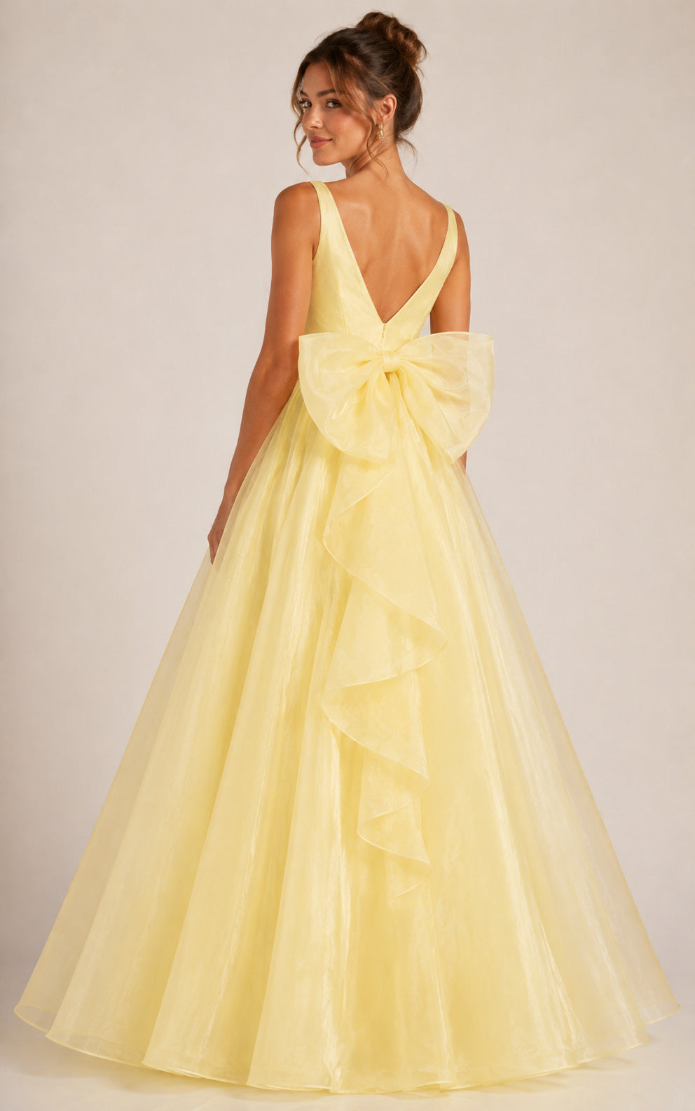 Pastel Yellow Organza Prom Dress with Oversized Bow V-Neck Gown back view