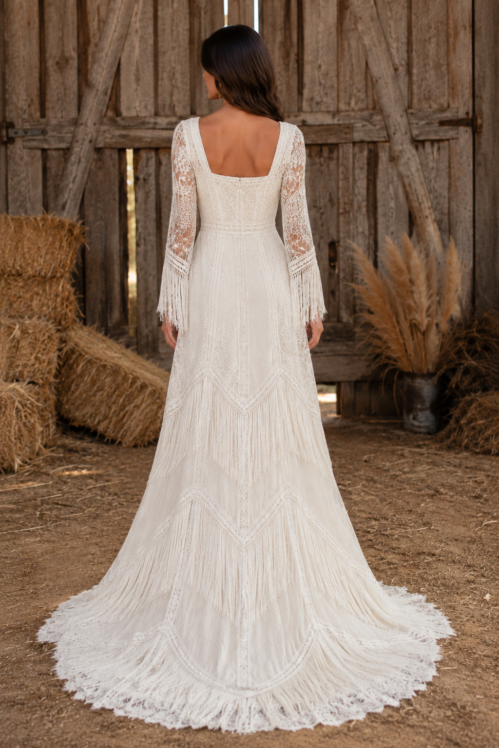 Ivory Square Neck Long Sleeve Lace Sheath Wedding Dress with Fringe Cuffs and Train back view