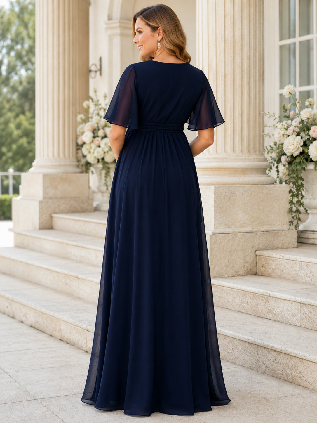 Dark Navy V Neck Flutter Sleeve Chiffon Empire Floor Maternity Evening Guest Gown back view