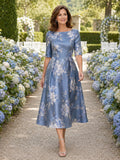 Dusty blue floral half sleeve A line midi wedding guest dress front view