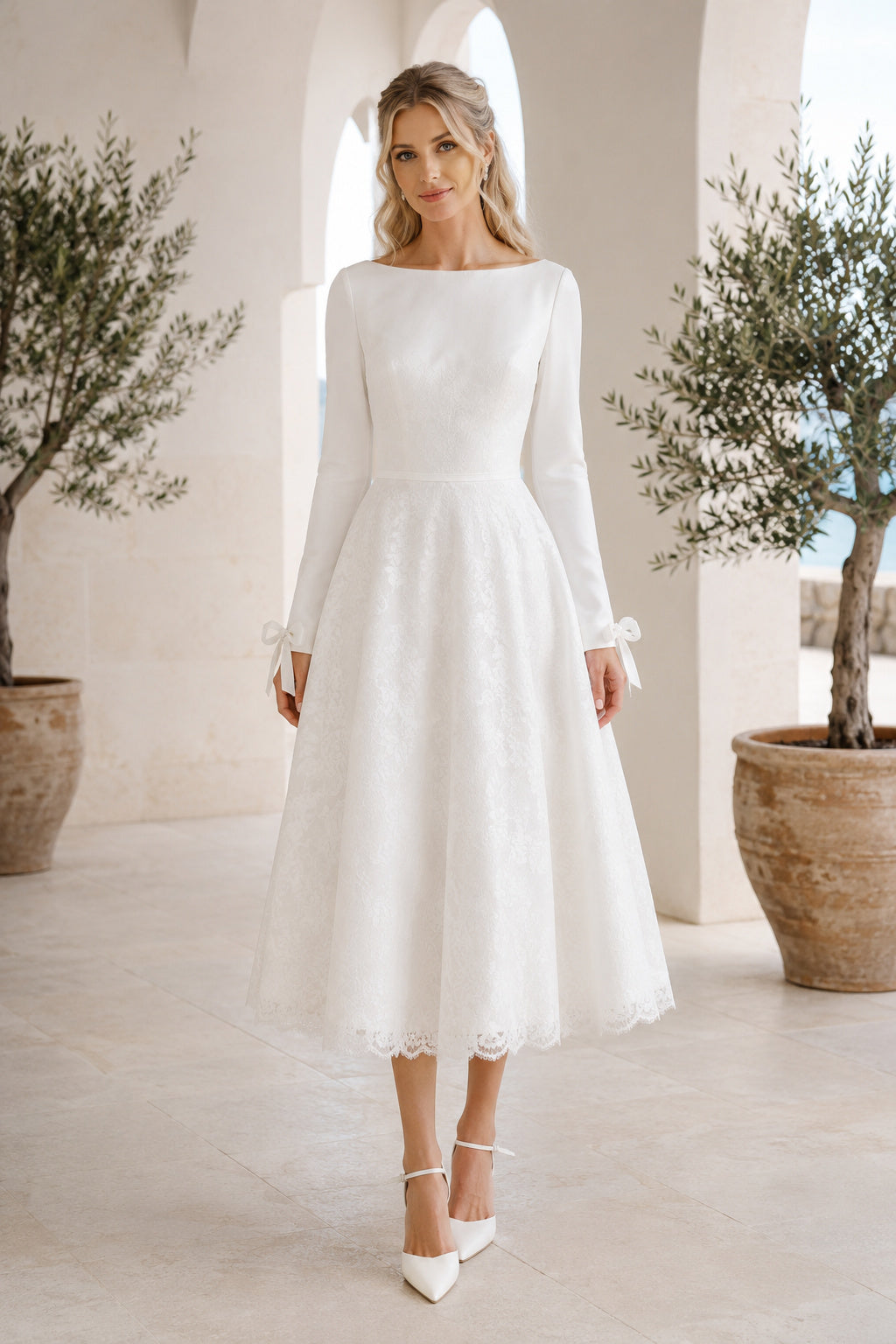 Ivory Bateau Neck Long Sleeve Satin Taffeta Tea-Length Wedding Dress with Long Sleeves and Bow Back front view