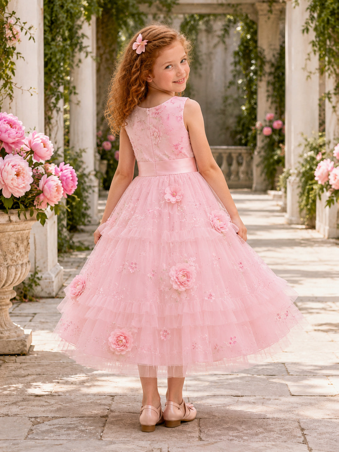 Playful Pink Peony Flower Girl Dress with Sleeveless Bodice, Layered Tulle Ruffles, Floral Appliques, and Tea-Length Skirt ba