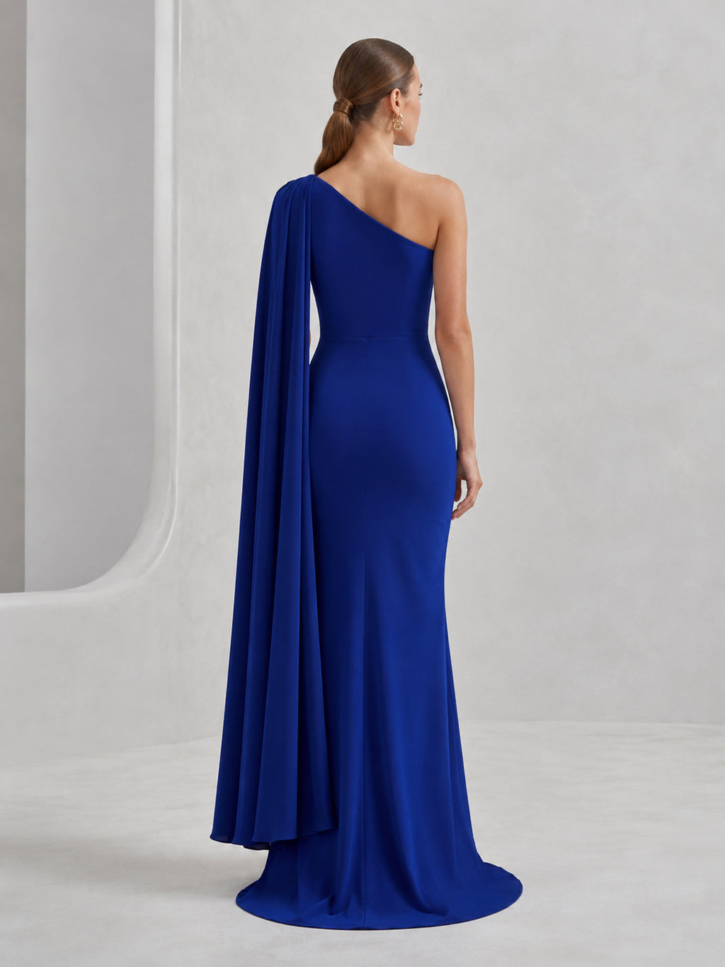 Royal blue one shoulder cape drape floor length gown back view