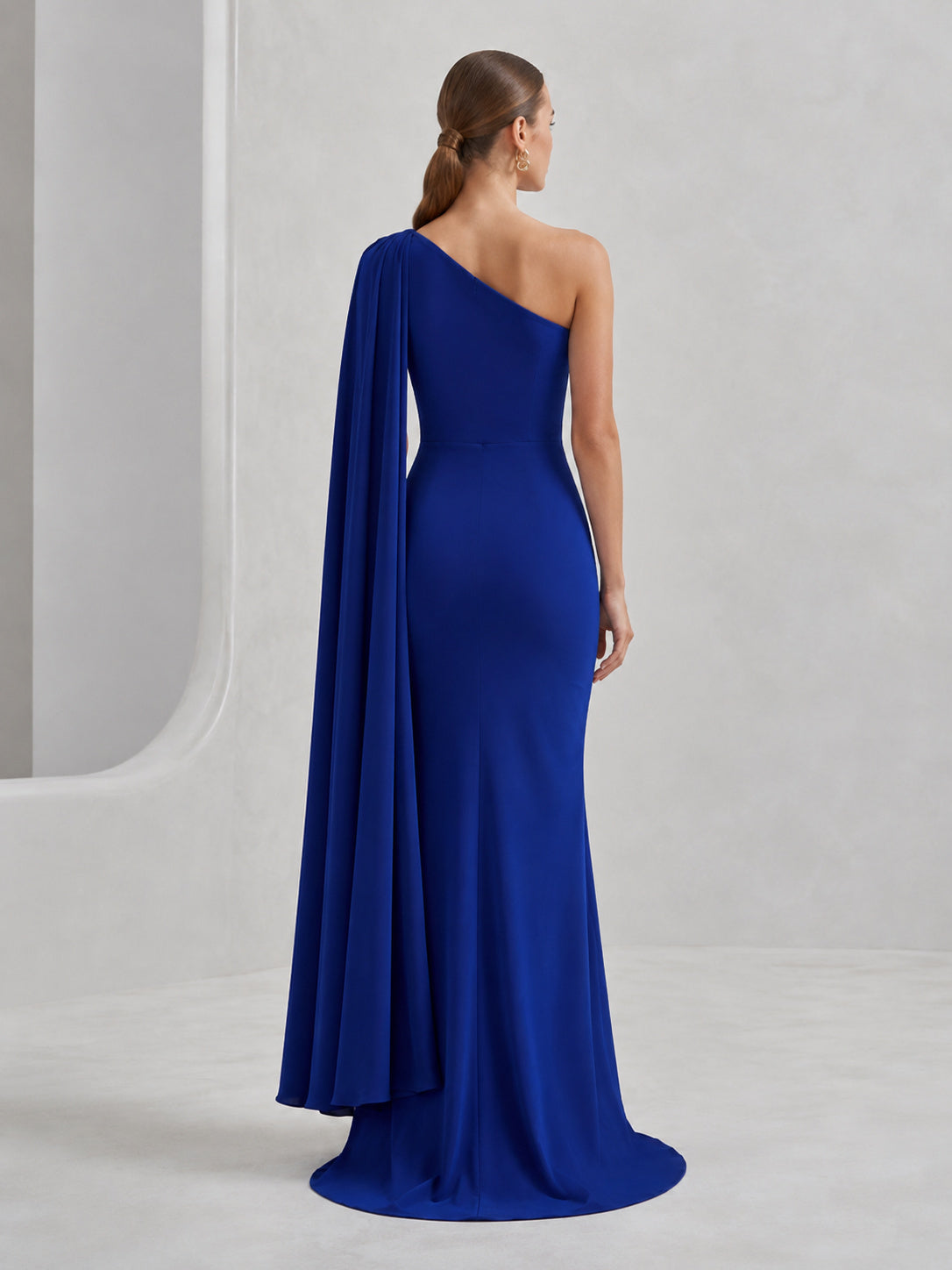 Royal blue one shoulder cape drape floor length gown back view