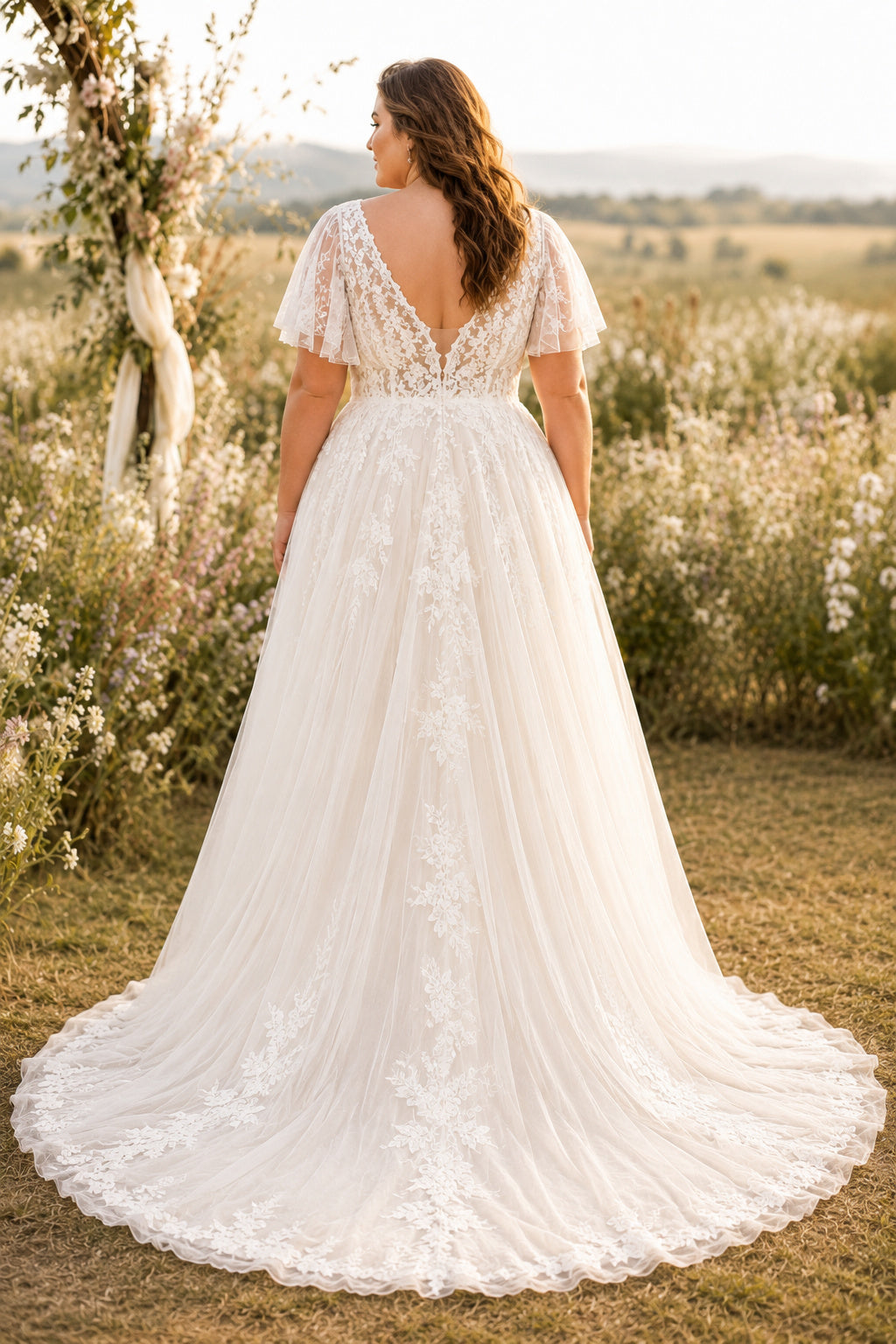 Ivory Plus Size V-Neck Lace A-Line Wedding Dress with Short Sleeves and Full Train back view
