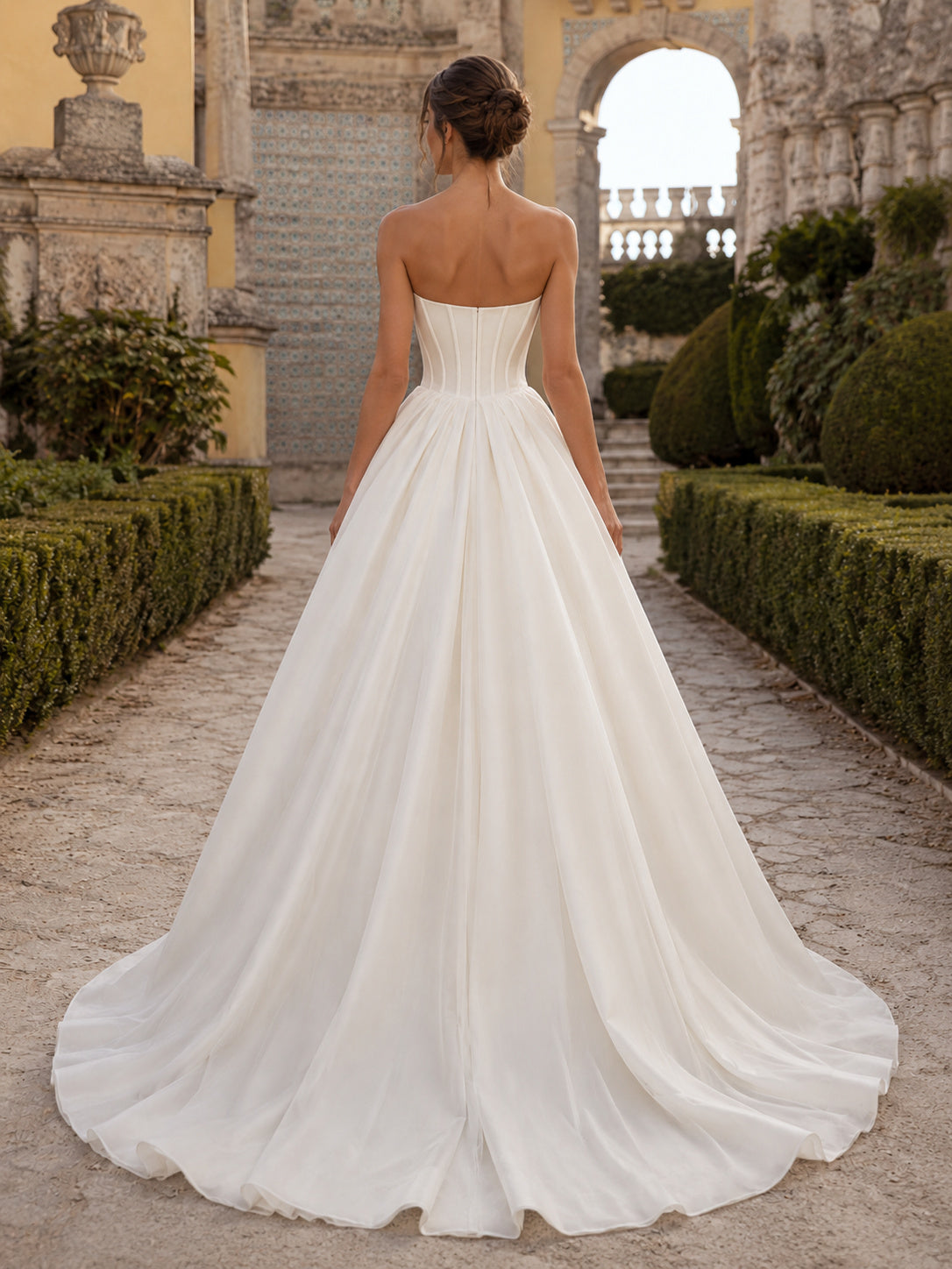 Modern Strapless Draped Satin Ball Gown Chapel Train Destination Wedding Dress back view