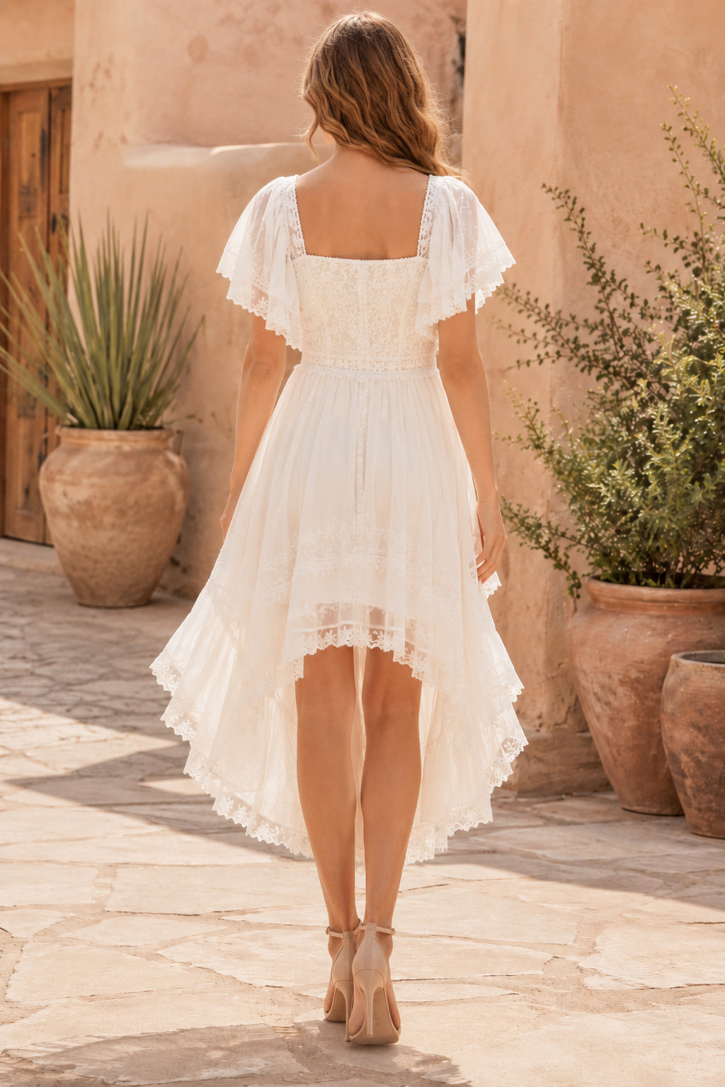 Ivory Square Neck High-Low Mini Wedding Dress with Flutter Sleeves and Pleated Skirt back view