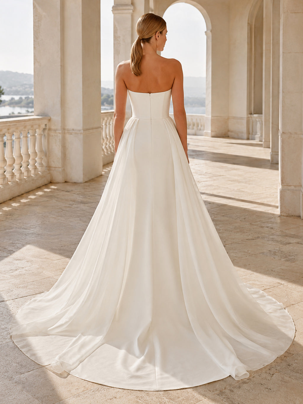 Tulle Wedding Dress Sheath Strapless Sweep Train Ruffle Detail Low V Back Bridal Gown back view