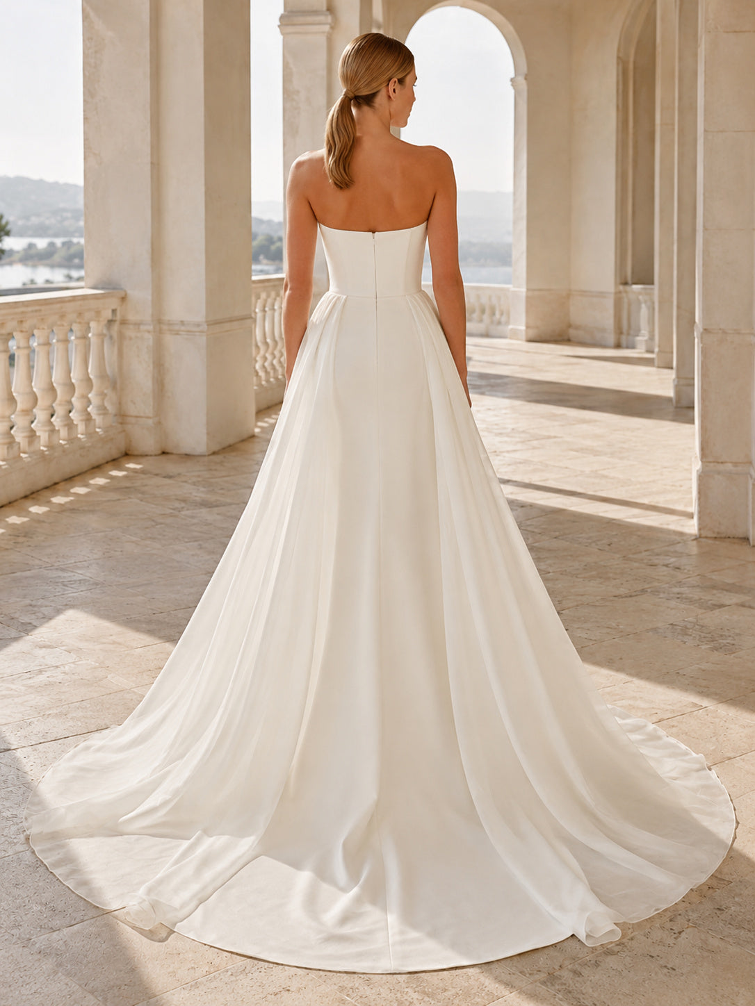 Tulle Wedding Dress Sheath Strapless Sweep Train Ruffle Detail Low V Back Bridal Gown back view