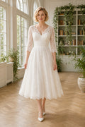 White V-neck Ball Gown Tulle Floor-length Wedding Dress With Front Slit and Beaded Waist and Open Back
