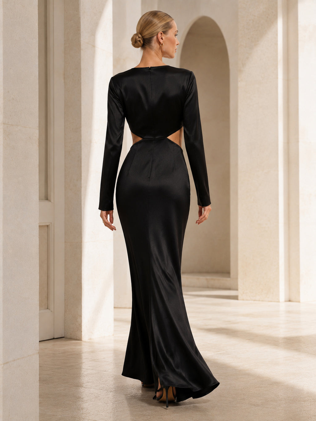 Black satin long sleeve cutout floor length evening gown back view