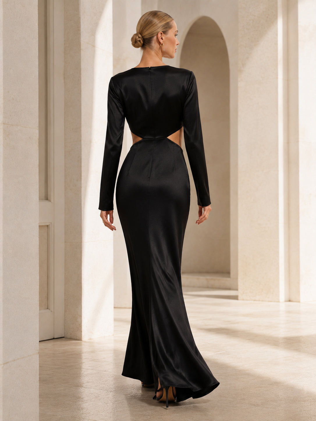 Black satin long sleeve cutout floor length evening gown back view