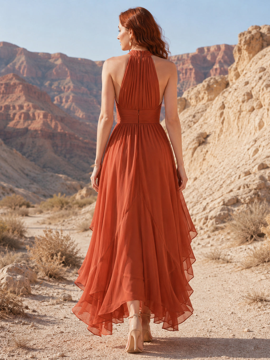Terracotta halter high-low desert wedding guest chiffon gown back view