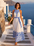 Blue border print halter tie neck island maxi dress front view