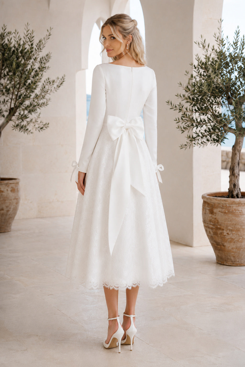 Ivory Bateau Neck Long Sleeve Satin Taffeta Tea-Length Wedding Dress with Long Sleeves and Bow Back back view