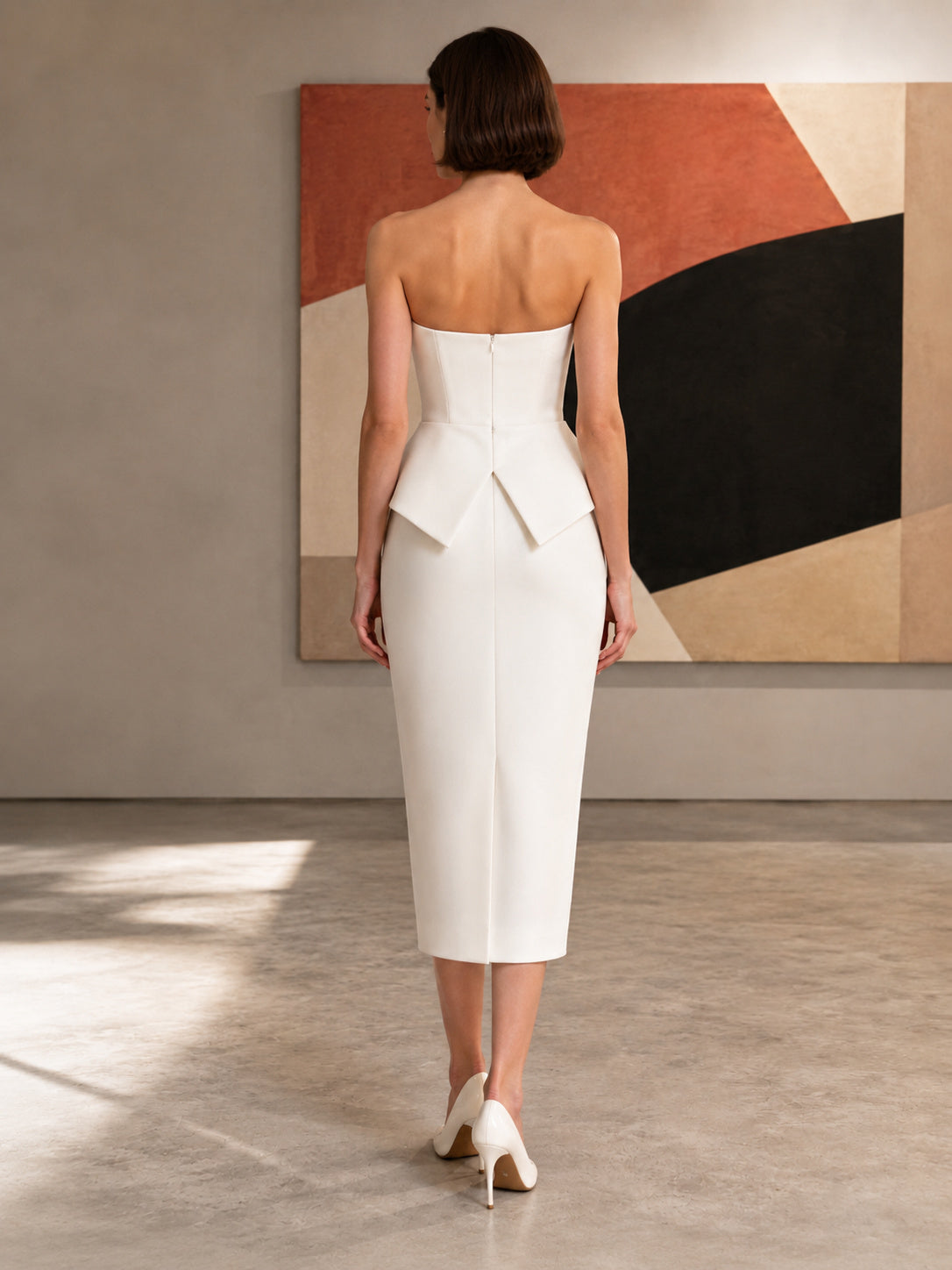 White strapless peplum sheath modern gallery cocktail midi dress back view