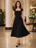 Black square neck cap sleeve A-line satin midi dress front view