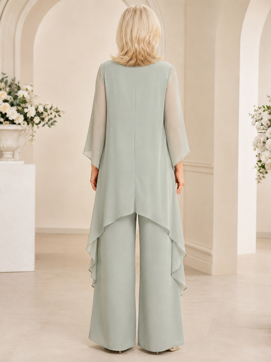 Celadon Mother Jumpsuit with Jewel Neck Asymmetrical Ruffle Cape and Wide Leg Pants back view