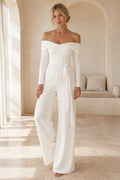 Ivory Off-the-Shoulder Long Sleeve Bridal Jumpsuit with Belted Waist front view