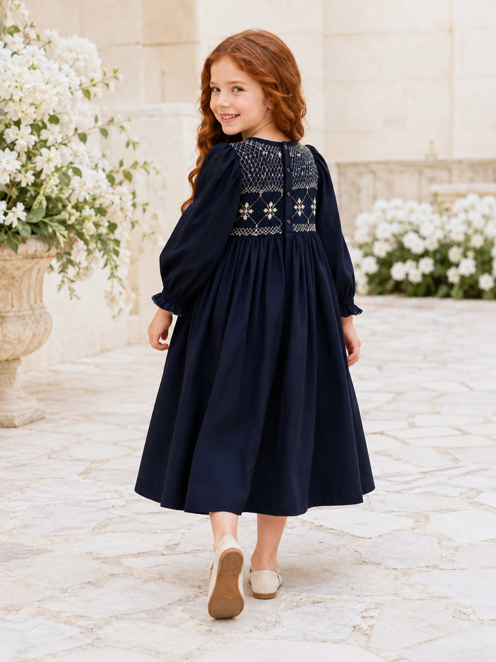 Navy Hand-Smocked Embroidered Long Sleeve Cotton A-Line Tea-Length Vintage Flower Girl Country Wedding Dress back view