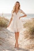 Ivory Lace V-Neck Short A-Line Wedding Dress with Cap Sleeves and Scalloped Hem for Beach Reception front view