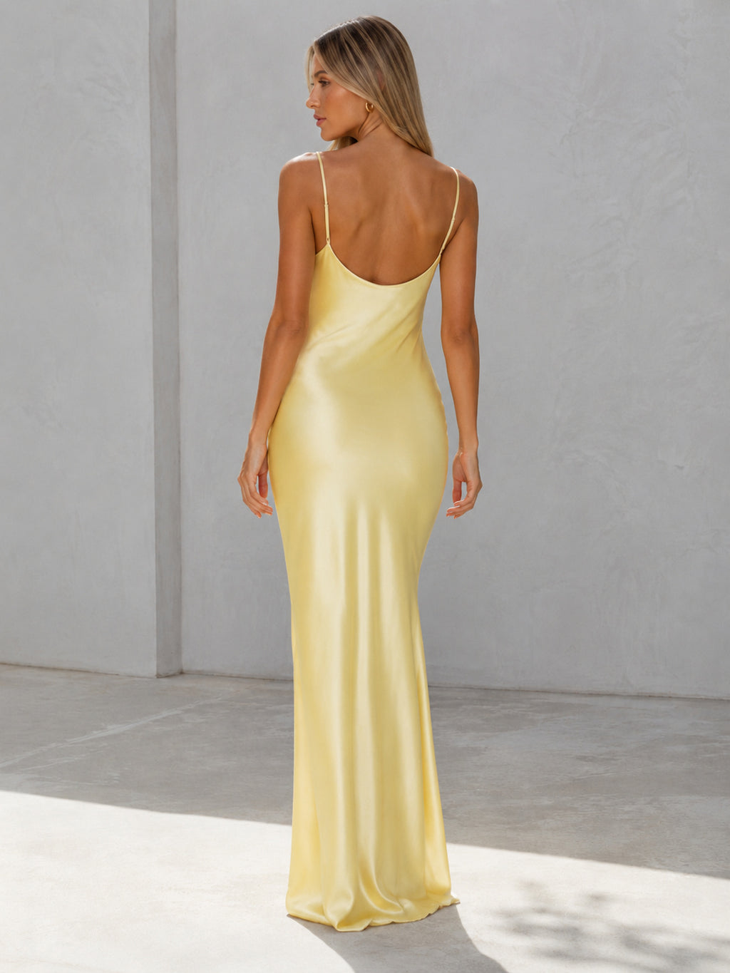 Pale yellow cowl neck satin slip maxi dress back view