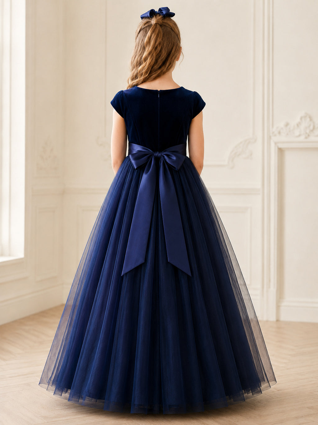 Navy Velvet Tulle A-Line Flower Girl Dress with Short Sleeves, Jewel Neck, Floor-Length Skirt and Bow Detail back view