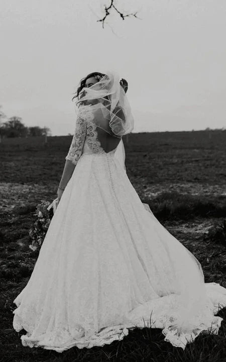 Pizzo senza schienale a mezza manica un abito da sposa vintage a-line